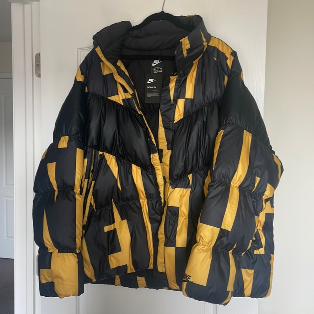 black and yellow Nike winter jacket